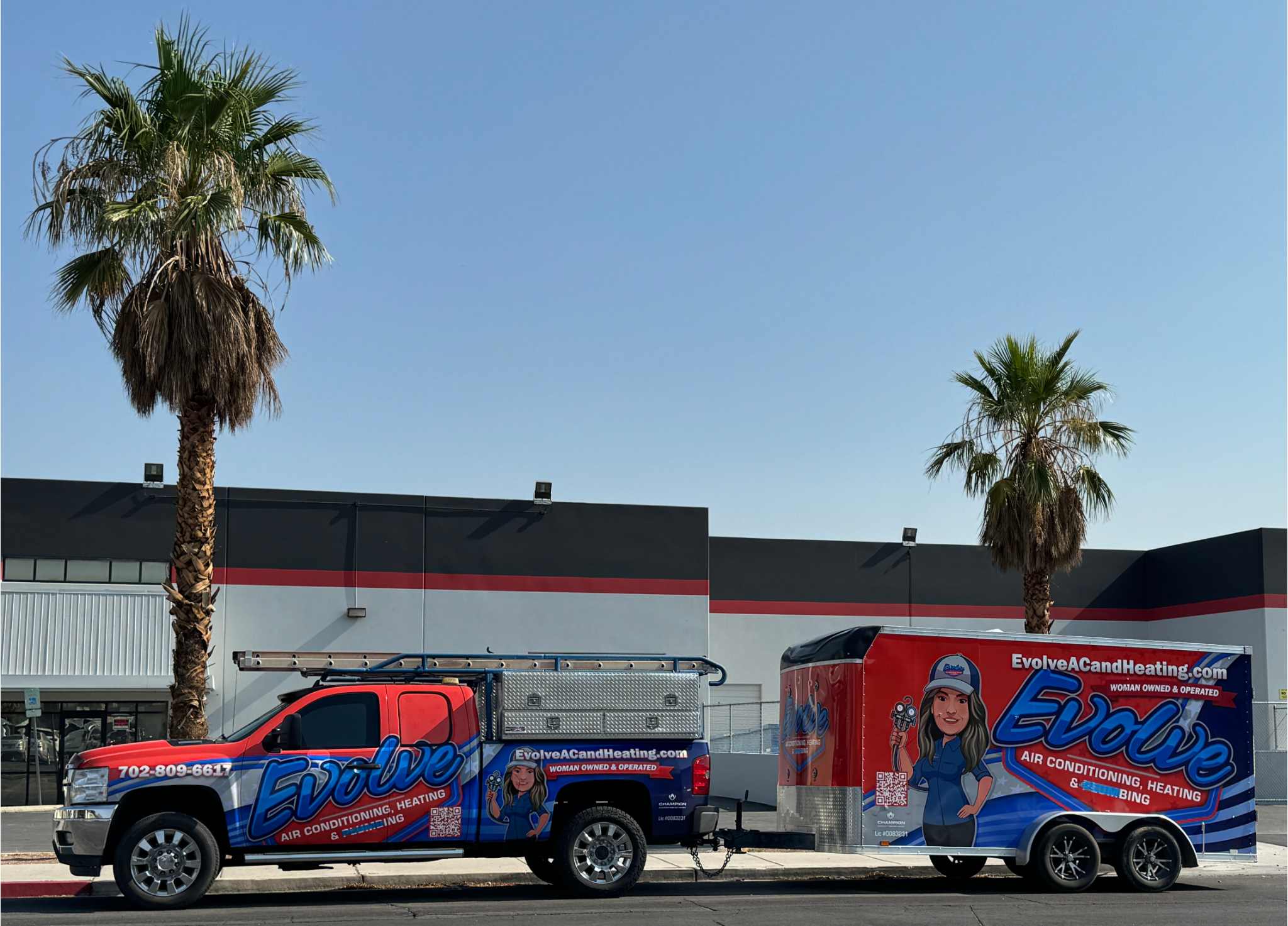 Evolve Air Conditioning truck and trailer parked in front of a commercial building with palm trees.