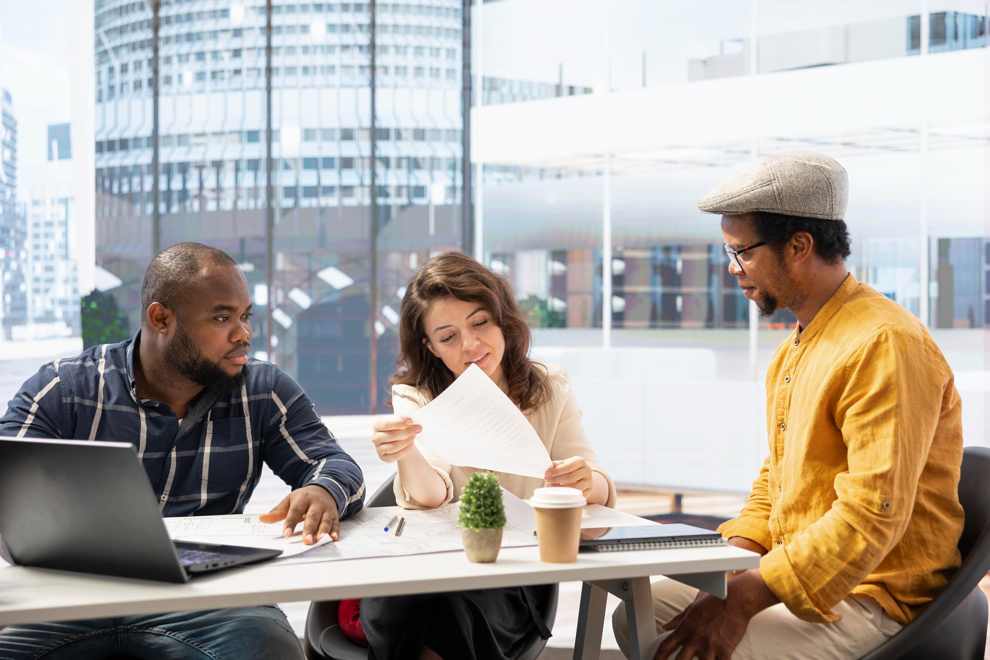 Doctor presenting to a team of colleagues in a bright conference room
