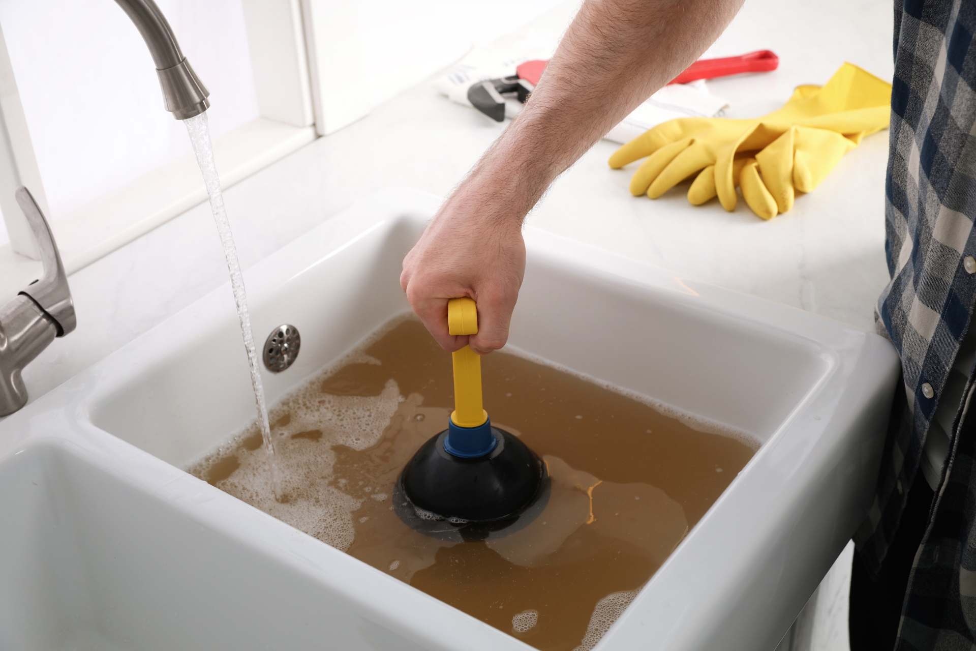 How to Fix a Clogged Drain: DIY Tips & When to Call a Professional