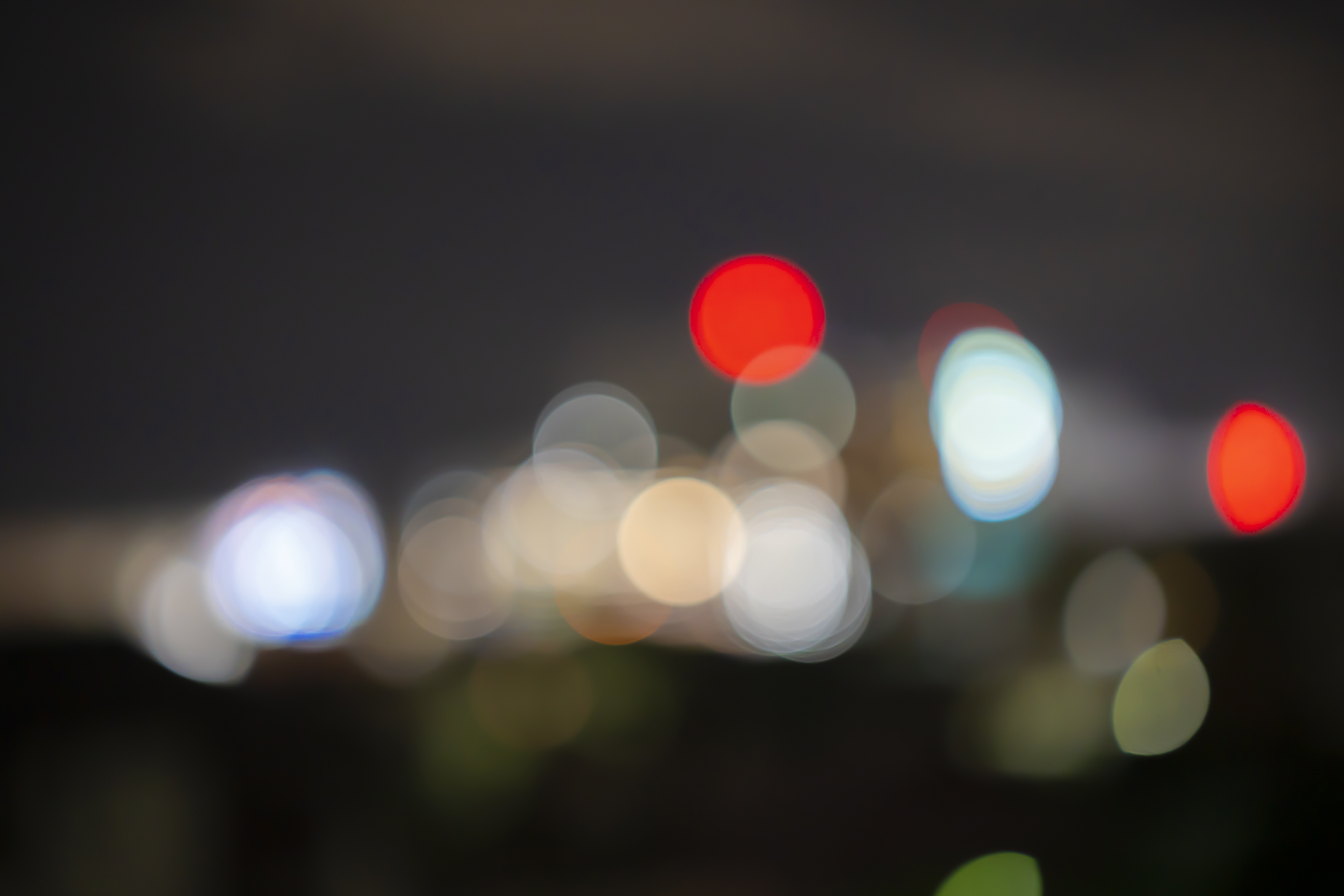 Blurred city lights at night creating a bokeh effect