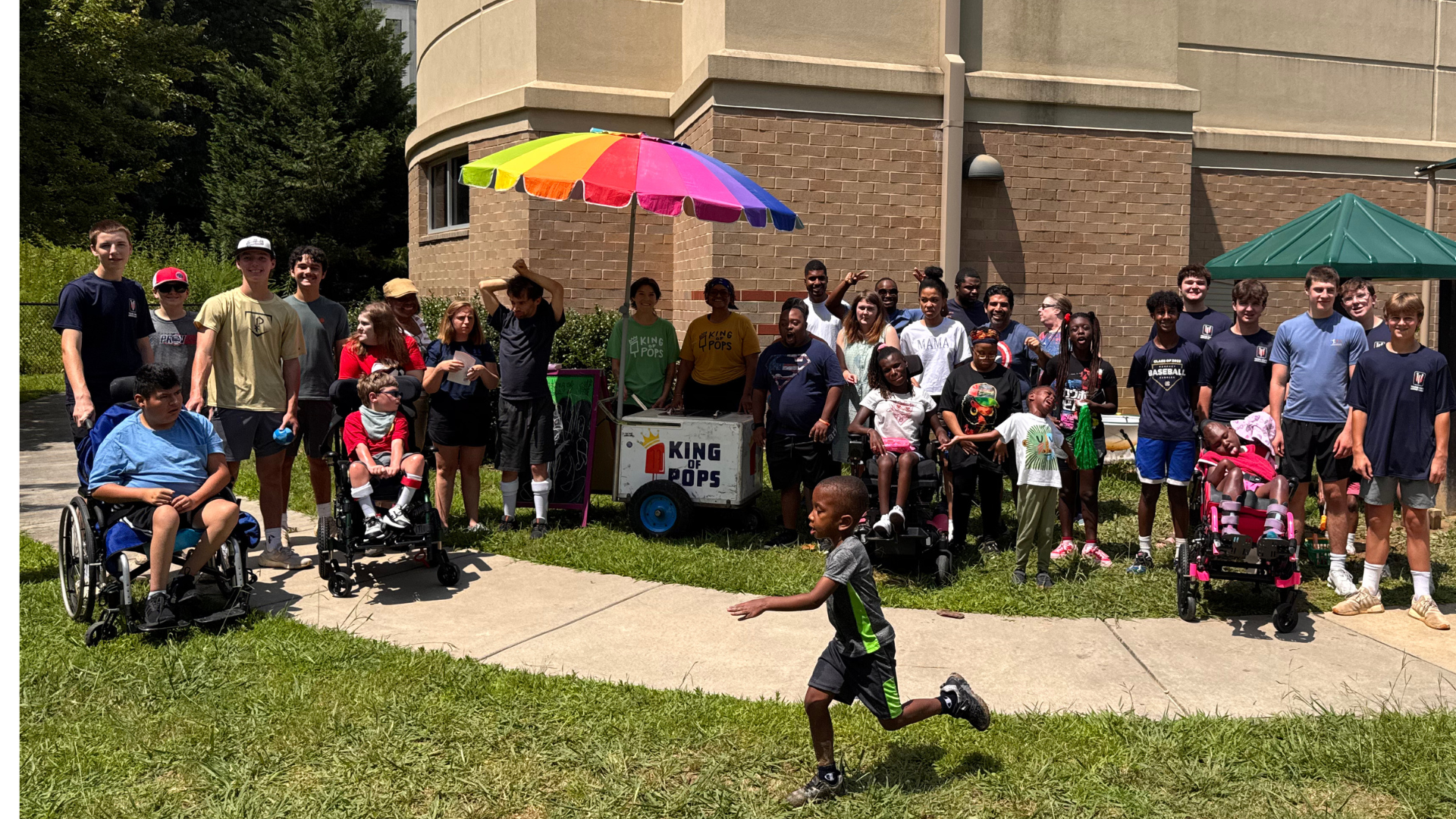 A group of children are sitting on the ground playing with clay.