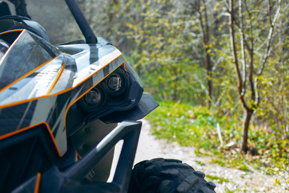 Close-up of an off-road vehicle on a forest trail