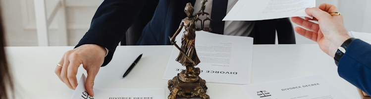 A divorced couple meeting with a financial advisor to discuss financial planning after their divorce