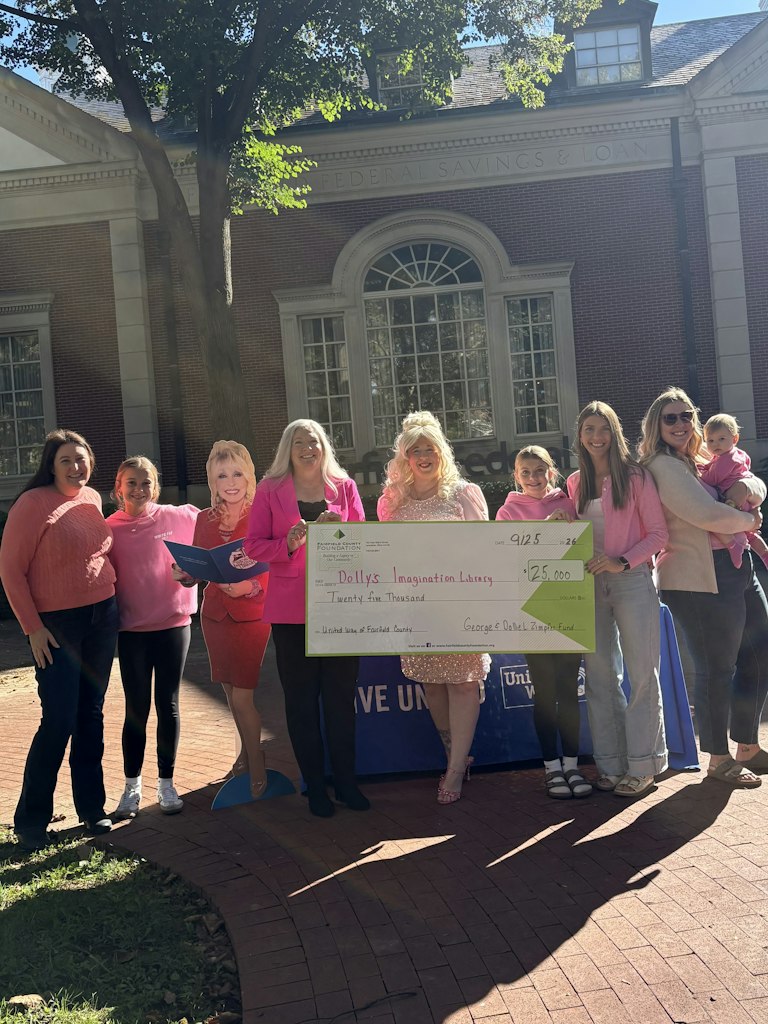 Fairfield County Foundation presenting a $25,000 check to the United Way of Fairfield County in support of the Dolly Parton Imagination Library in front of Fairfield Federal Savings & Loan