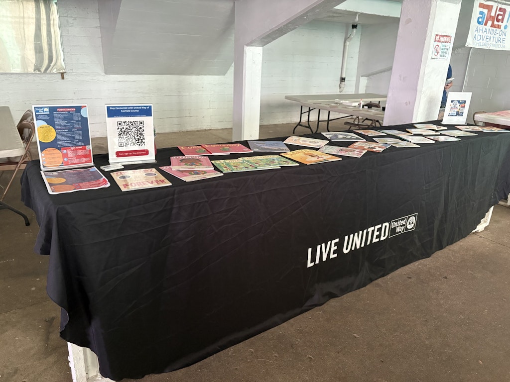 United Way of Fairfield County booth set up at the Fairfield County Fairgrounds for the Lancaster Festival Fair Day inside of the grandstand.